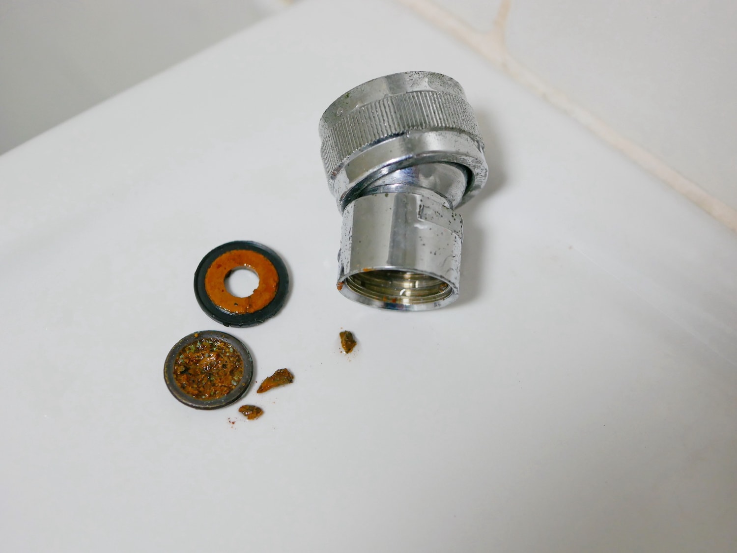 how to increase water pressure in shower closeup view of rusted showerhead