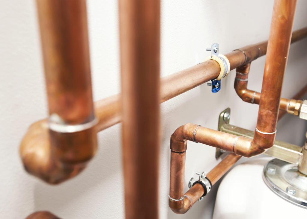 copper pipes in a boiler room: copper pipes vs pvc pipes