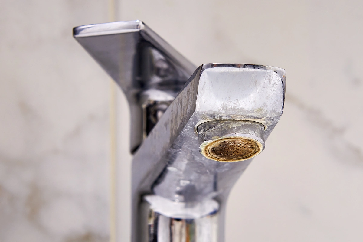 bathroom faucet with hard water stains