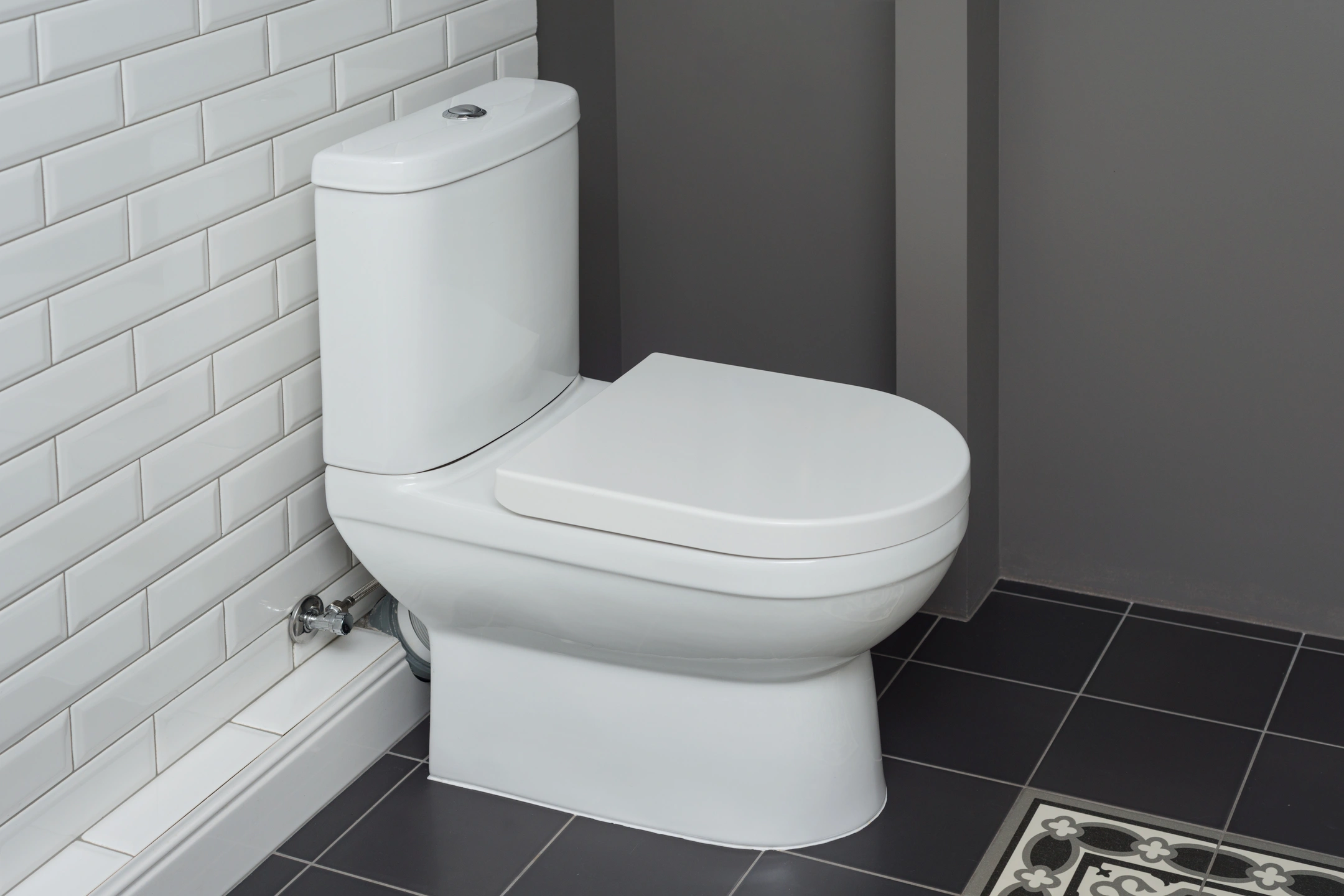 new kohler toilets with button flush feature