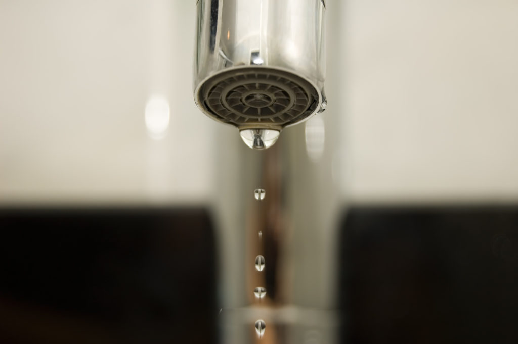 leaking faucet needing bathroom sink repair