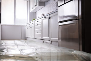 refrigerator leaking water on the floor