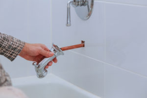 replace a bathtub faucet